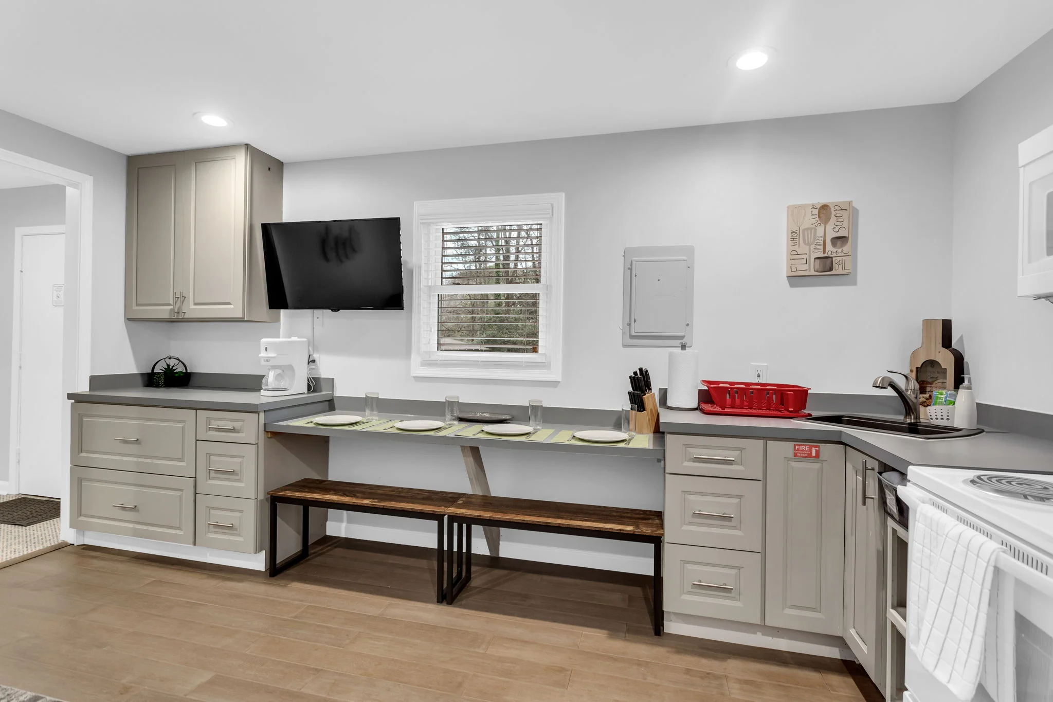 Modern small kitchen design with bench seating